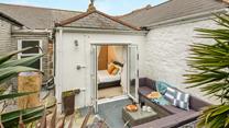 Step from bedroom 4 onto the patio and sip your morning coffee.
