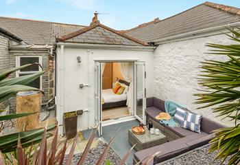 Step from bedroom 4 onto the patio and sip your morning coffee.