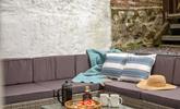 The patio has plenty of seating for everyone to breakfast al fresco! - Thumbnail Image
