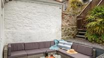 Head from the patio to the elevated decking for a moment of calm.
