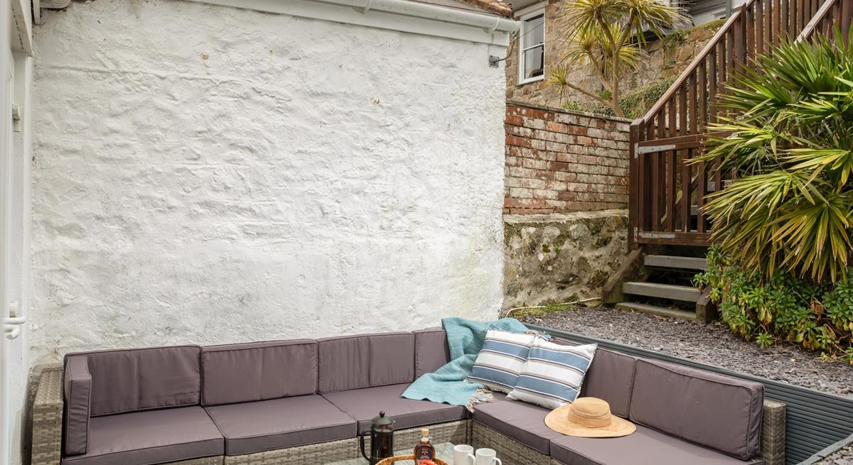 Head from the patio to the elevated decking for a moment of calm.