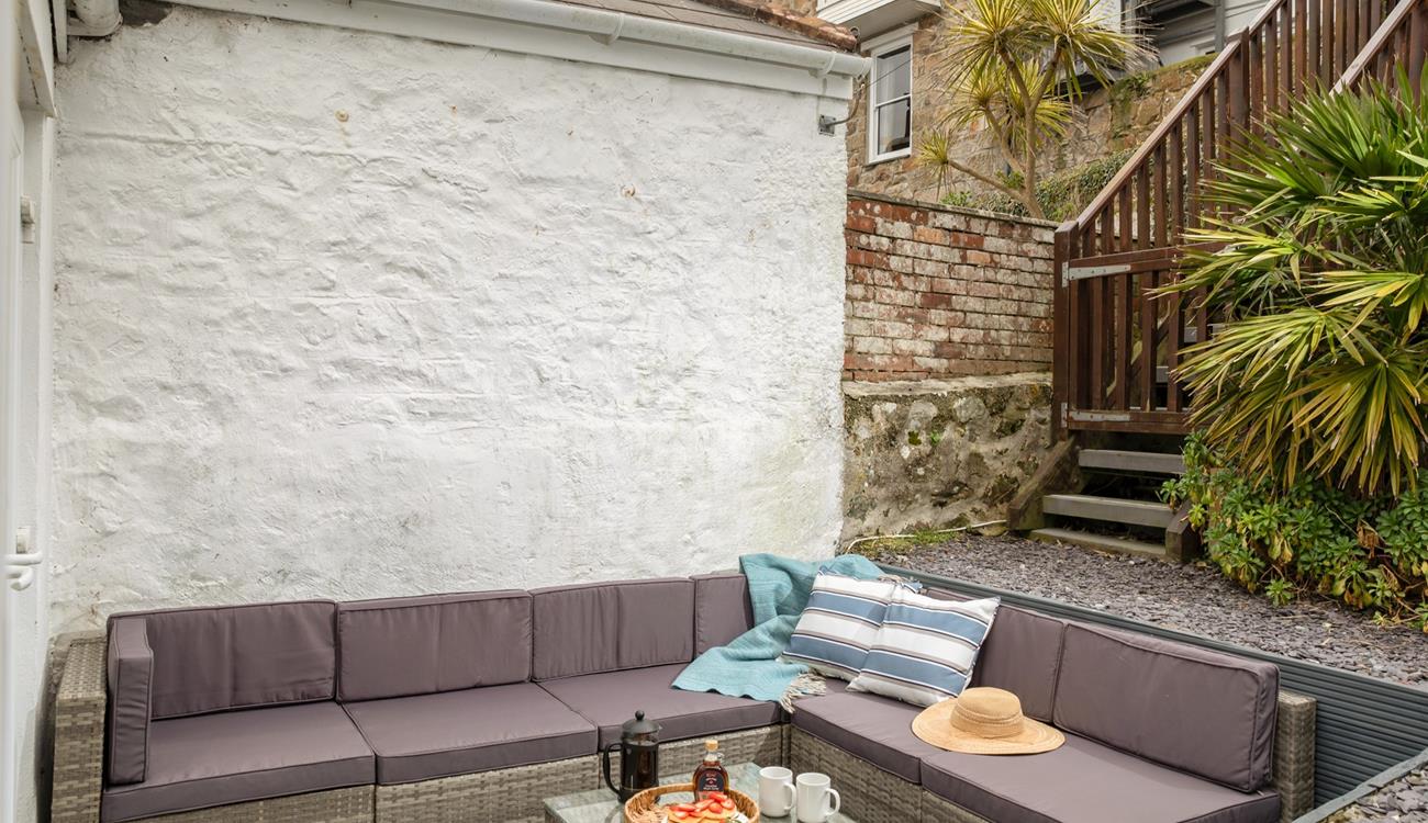 Head from the patio to the elevated decking for a moment of calm.