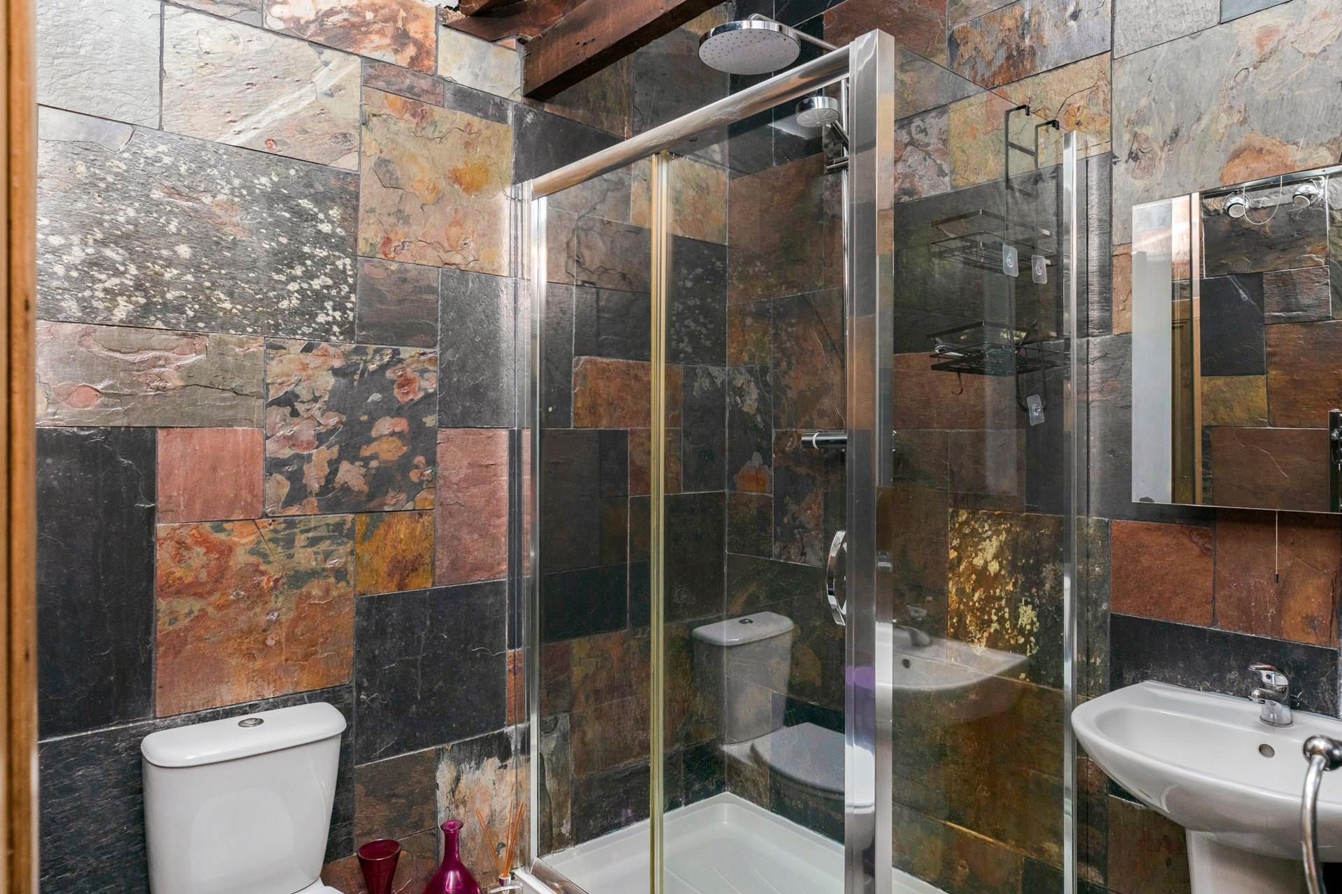 Wash off sandy toes in the shower after a day on Porthminster beach.