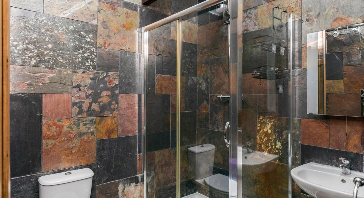 Wash off sandy toes in the shower after a day on Porthminster beach.