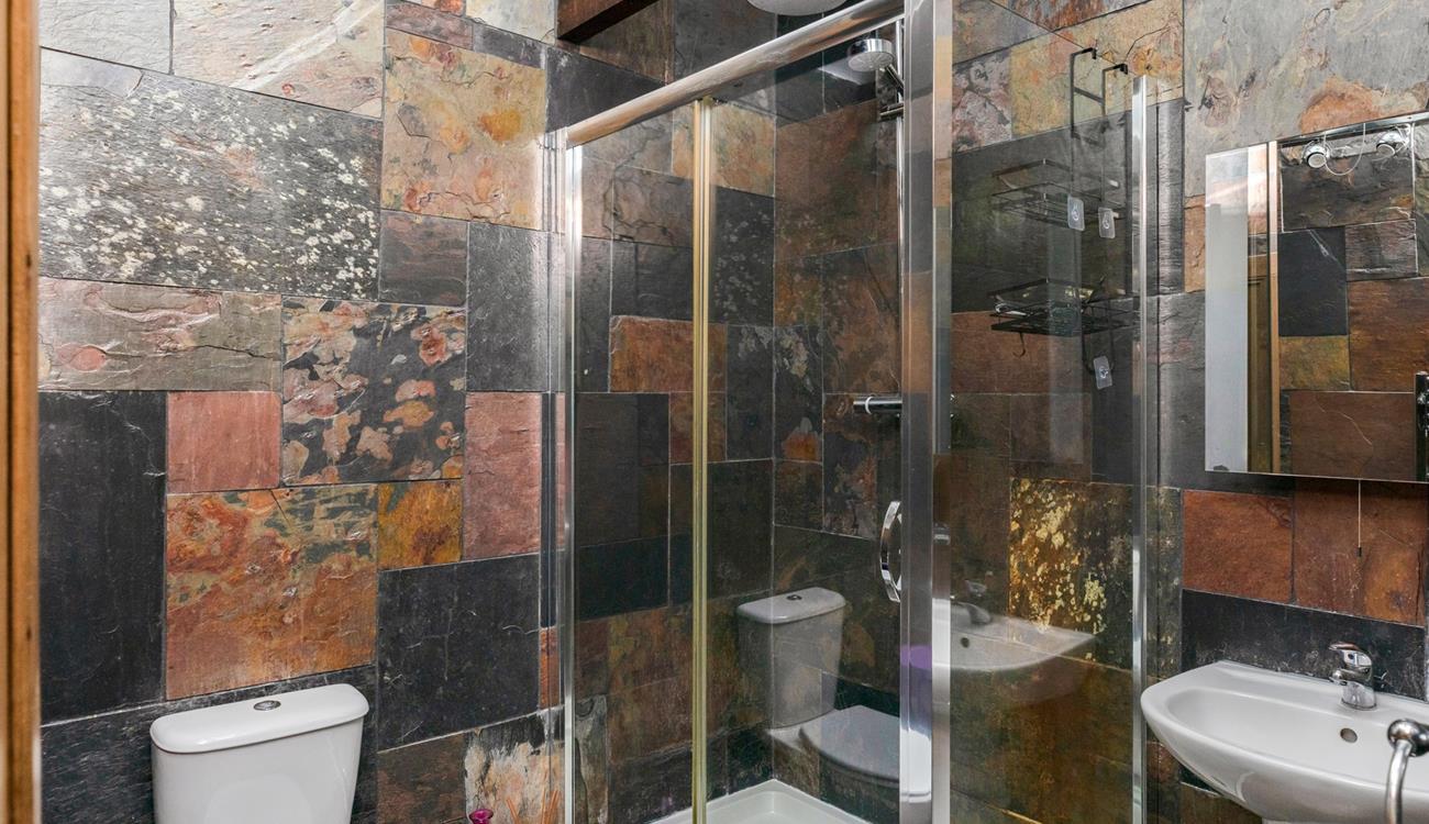 Wash off sandy toes in the shower after a day on Porthminster beach.