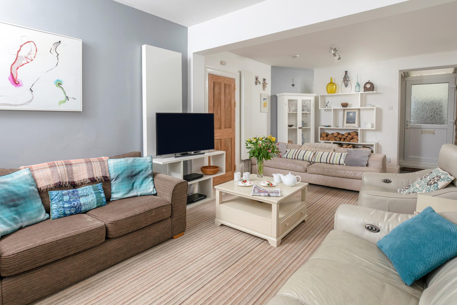 There is plenty of seating for all eight guests to relax and unwind.