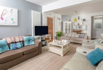 There is plenty of seating for all eight guests to relax and unwind.