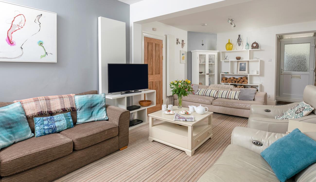 There is plenty of seating for all eight guests to relax and unwind.