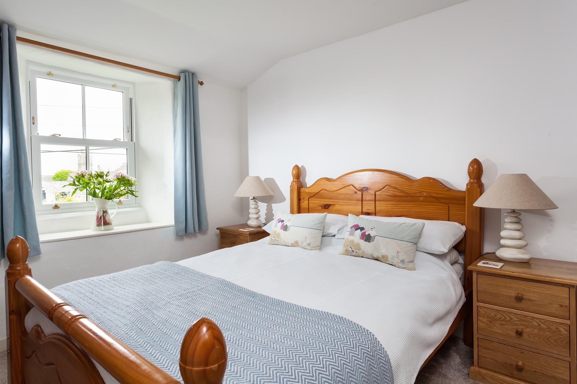 The master bedroom is the perfect place to rest after busy days exploring Cornwall.