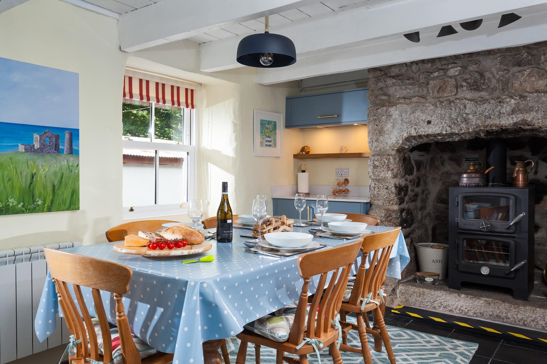 Cook up a delicious meal in your traditional cottage kitchen complete with Belfast sink and woodburner.