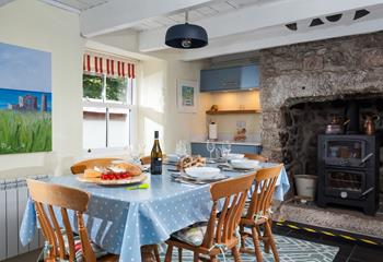 Cook up a delicious meal in your traditional cottage kitchen complete with Belfast sink and woodburner.