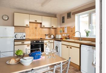 Well-equipped and practical, the kitchen has all you need for your stay here. 