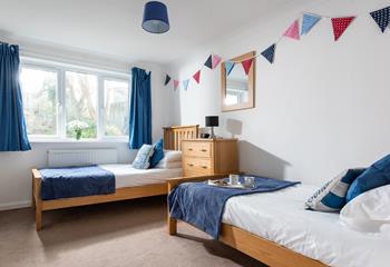 Bright and colour, bedroom 2 is perfect for two children sharing. We love the bunting!