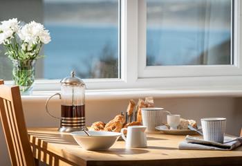 Enjoy a leisurely breakfast, admiring the views across Carbis Bay. 
