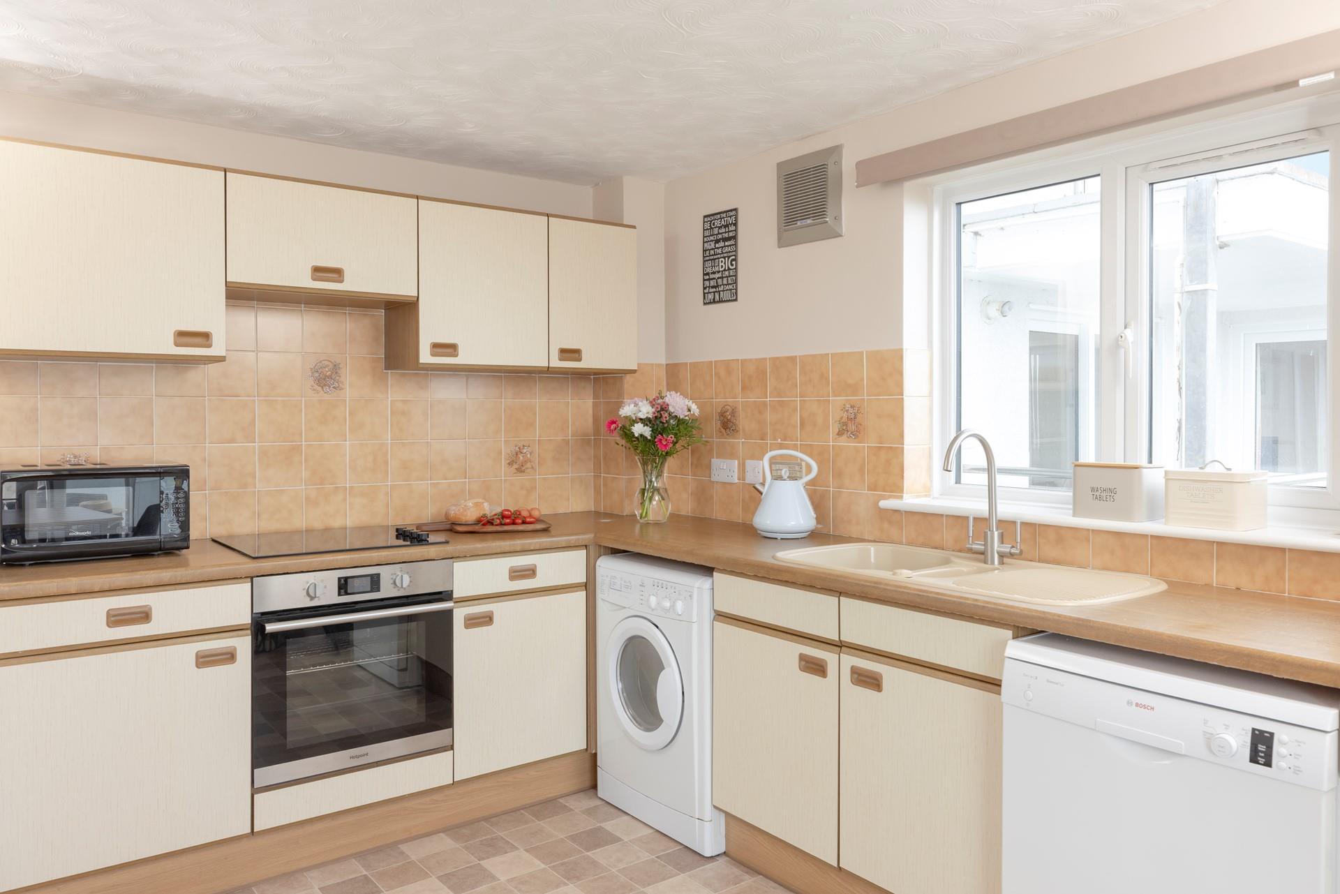 Well-equipped and practical, the kitchen has all you need for your stay here.