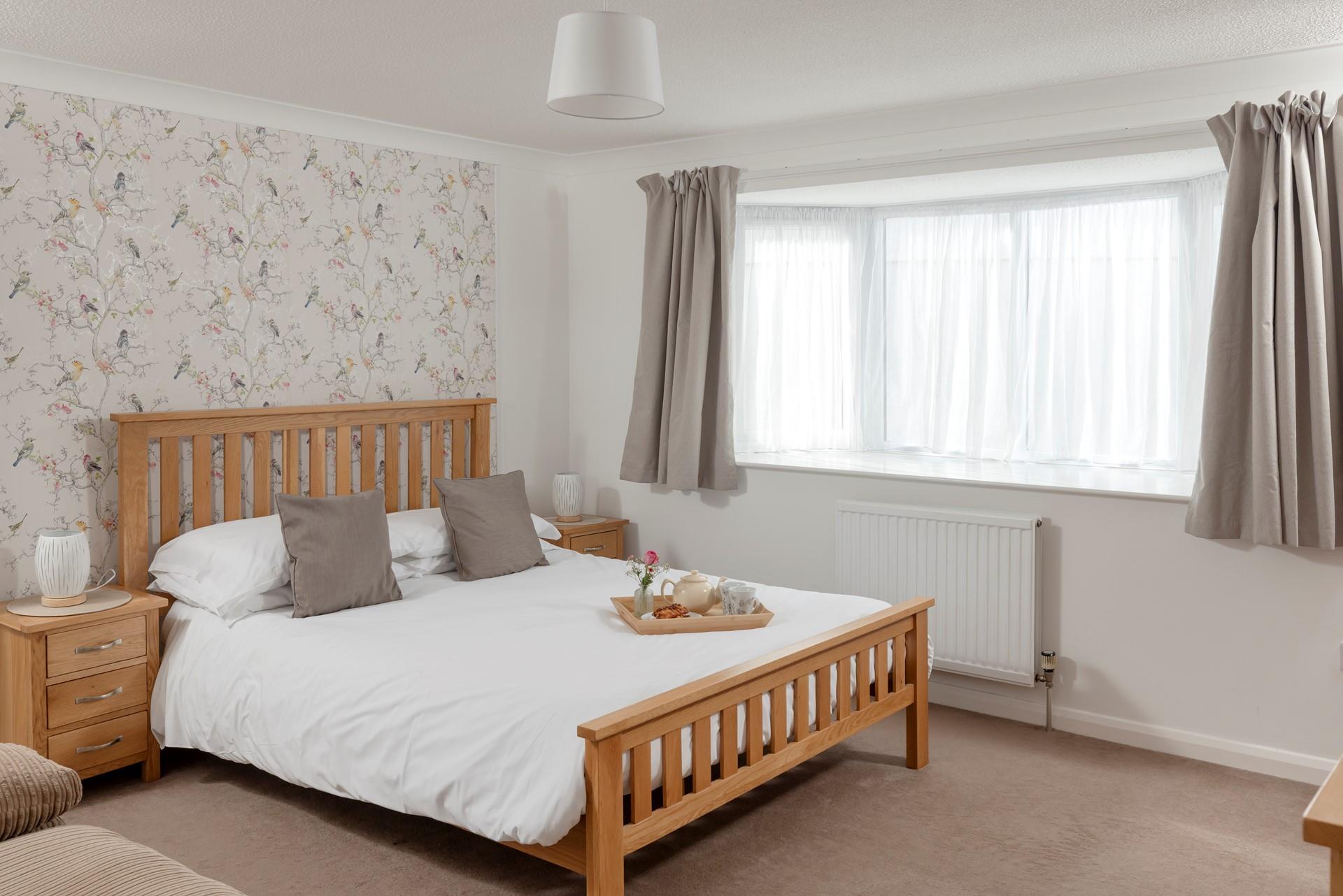 Relax into the comfortable king size bed in bedroom 1 and recharge your batteries. 