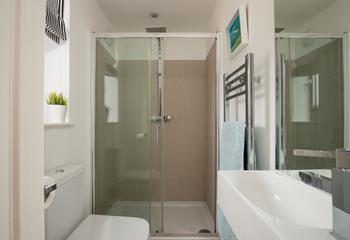 The en-suite shower room from the master bedroom offers an invigorating shower to start your day.