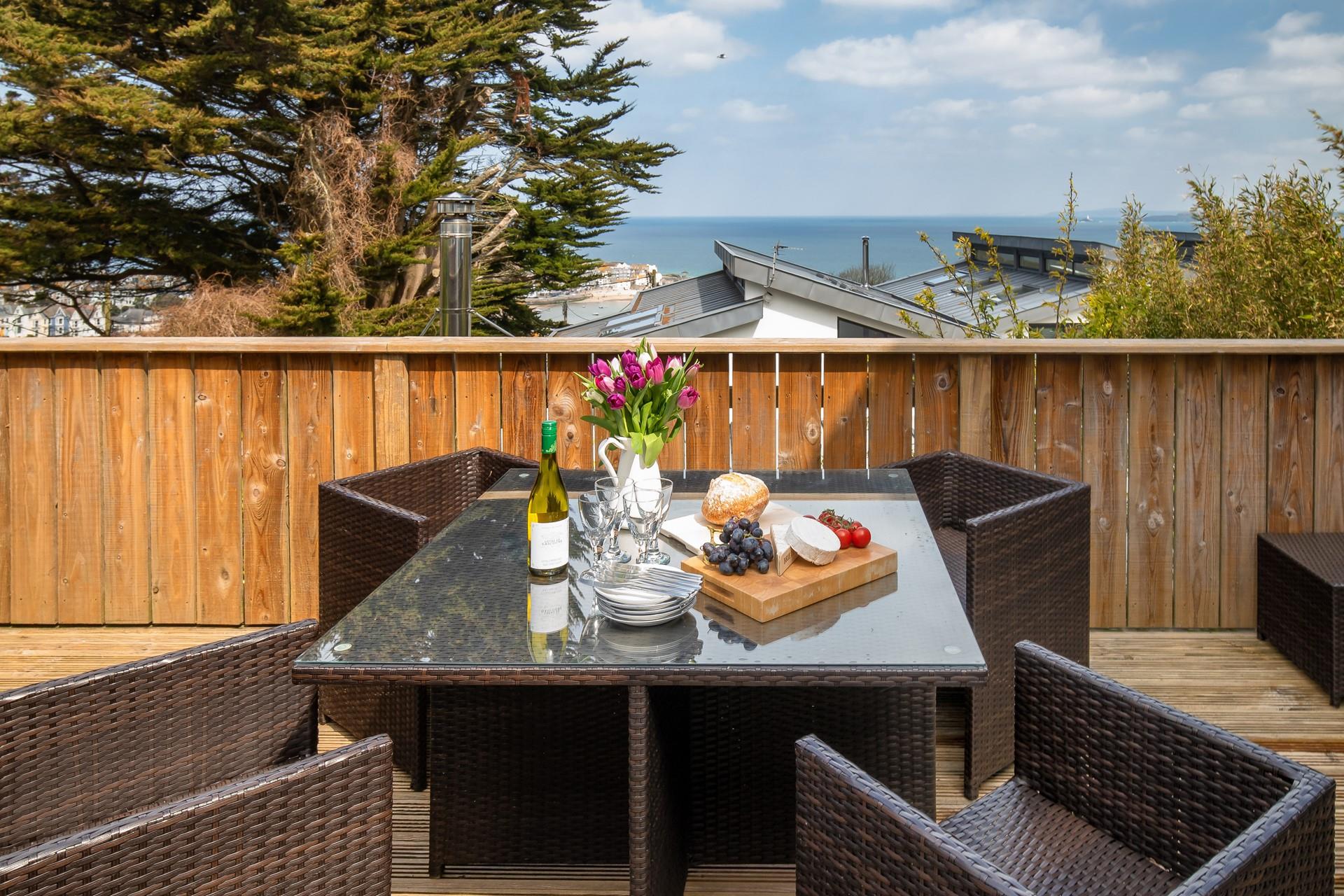 Enjoy watching the sun come down with a cocktail in hand.