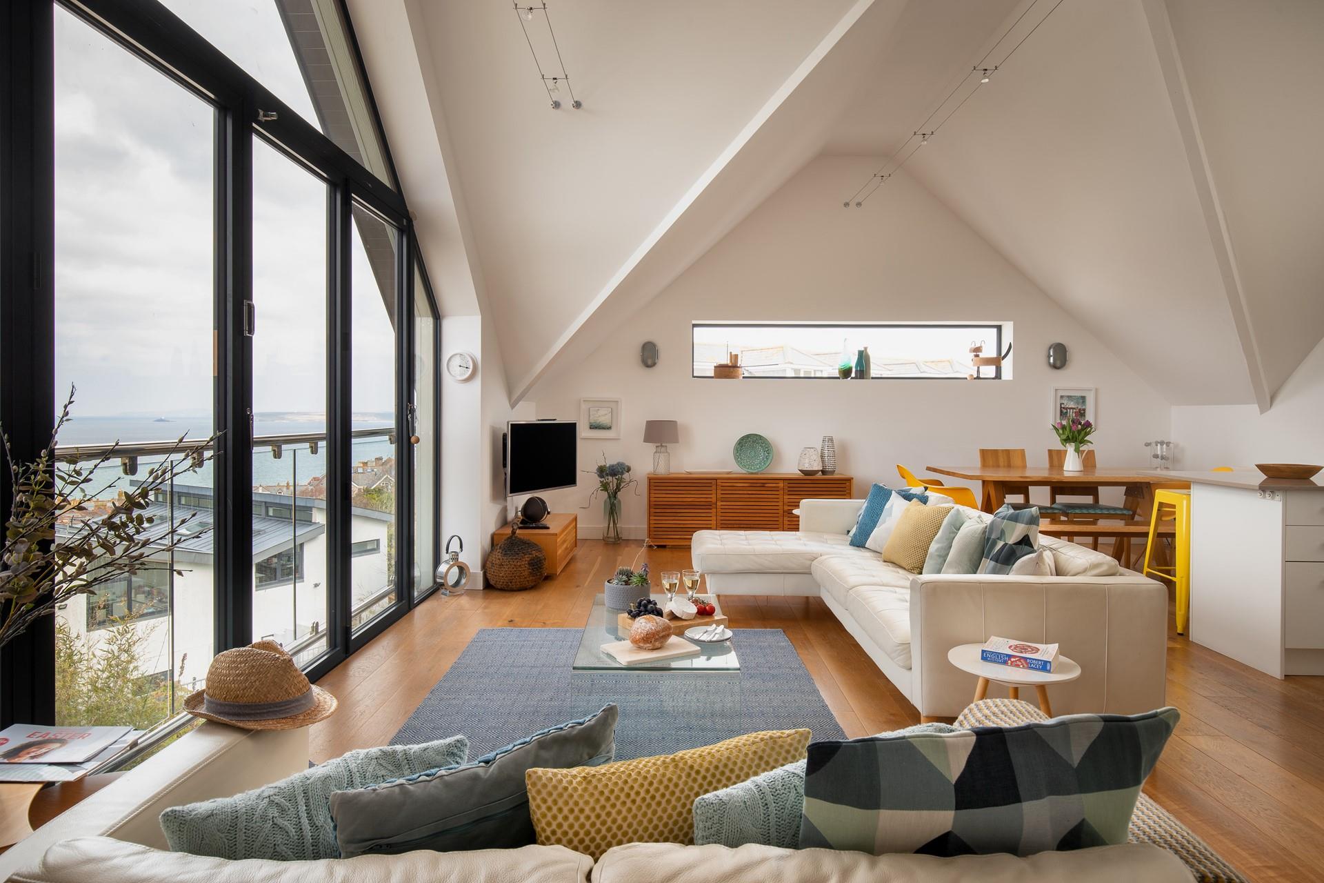 Open a bottle of wine to sip as you watch the sun go down in the comfort of your apartment.