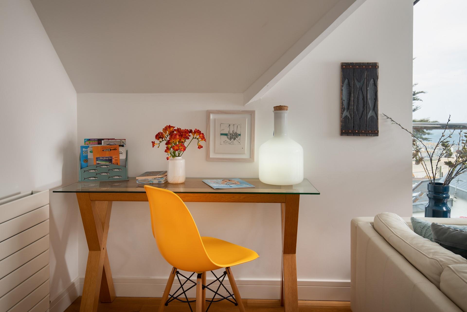 The property features seaside inspired artwork.