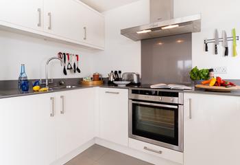 The well-equipped kitchen is perfect for rustling up meals or treat yourself to a meal out.