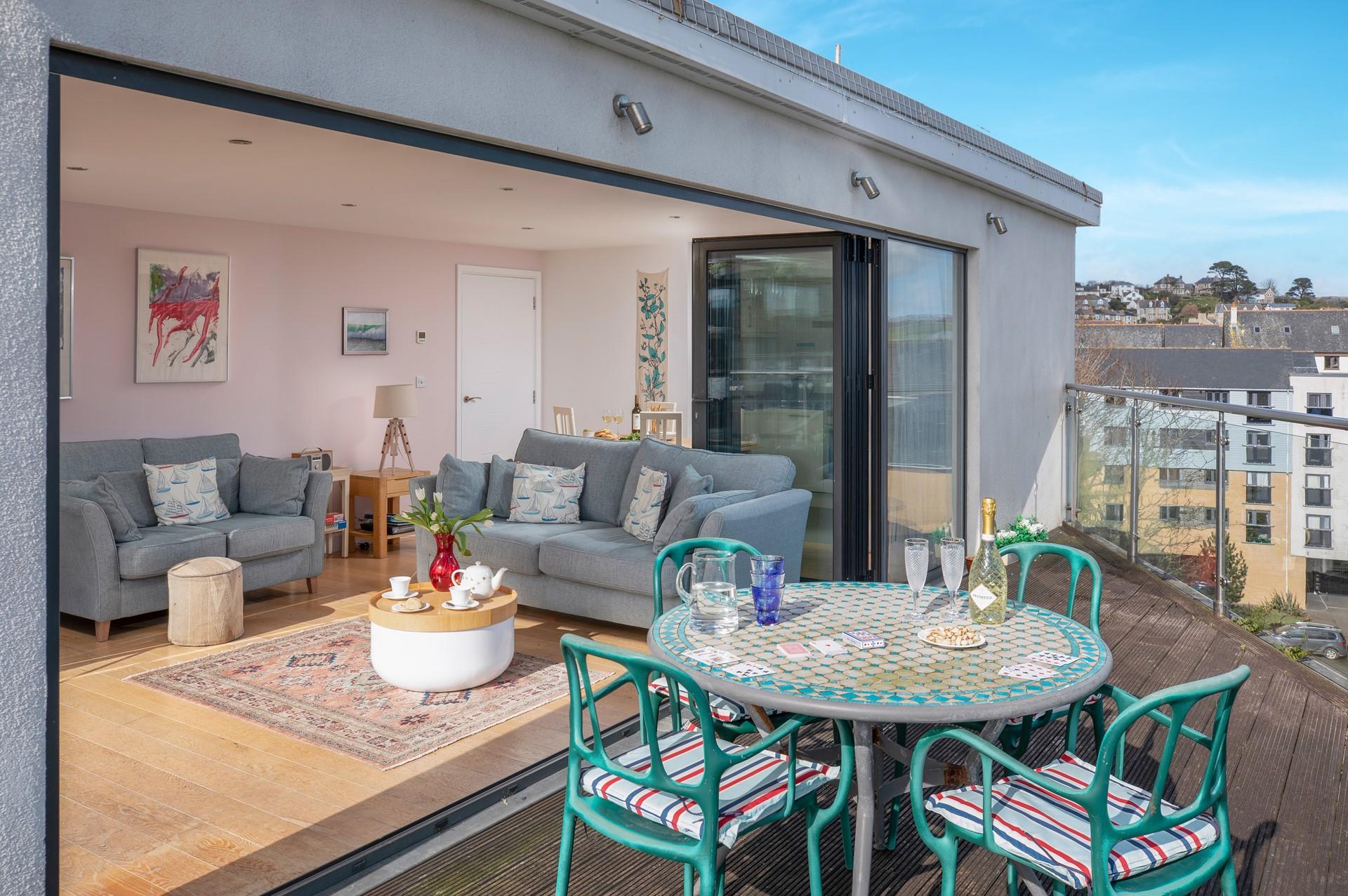 Relax with a glass of wine storm watching in the sitting room.