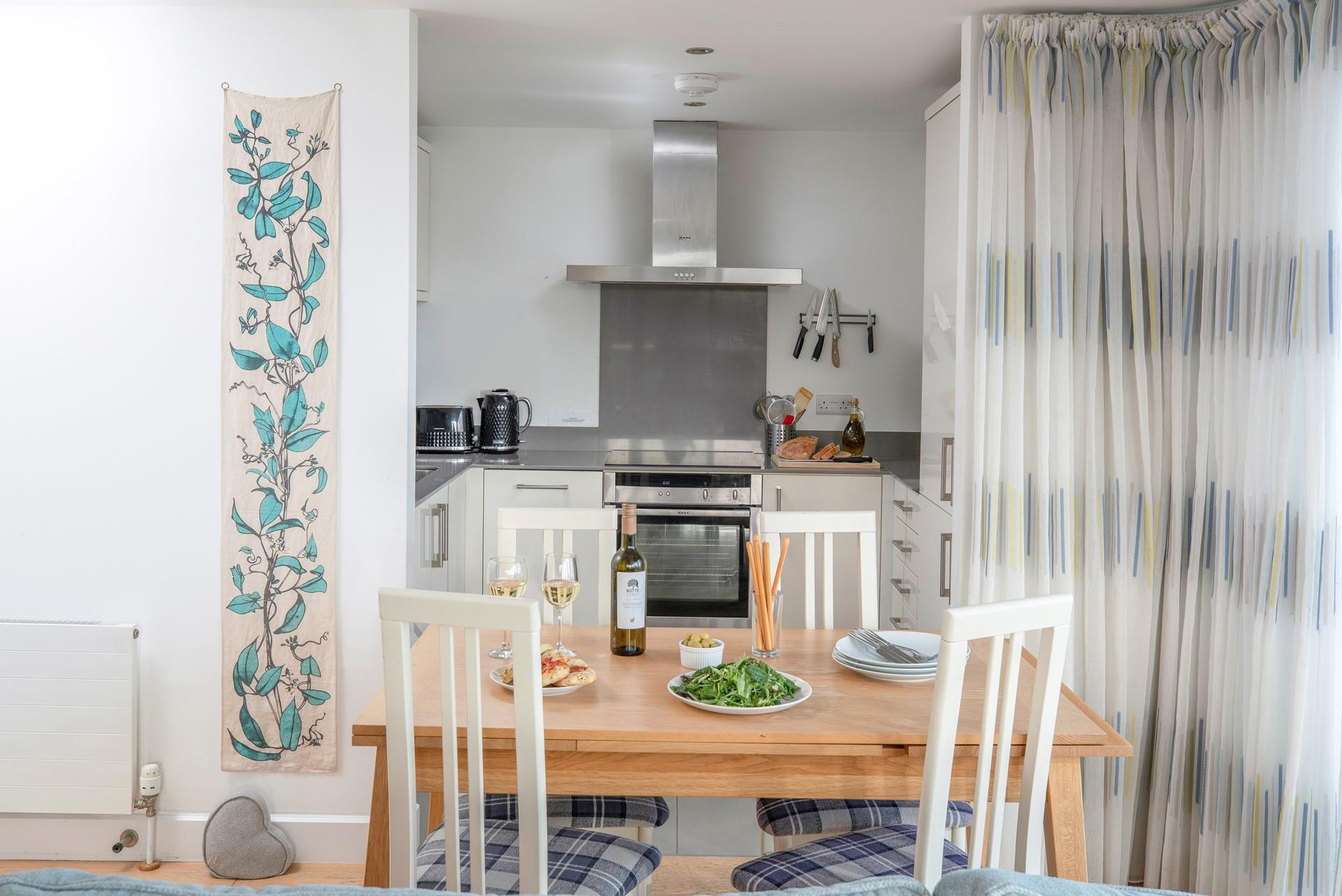 The well-equipped kitchen is perfect for rustling up meals or treat yourself to a meal out.