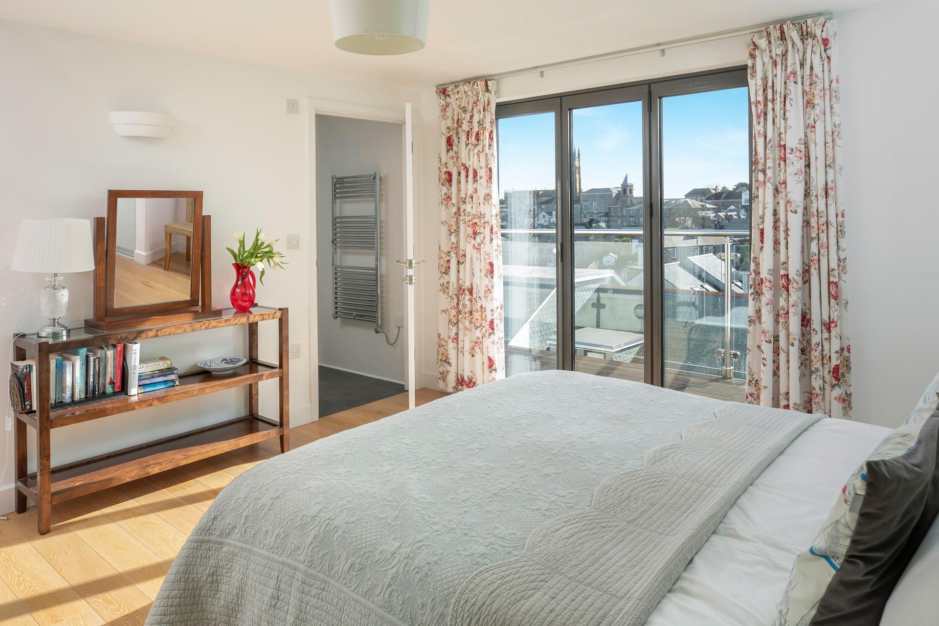 Bedroom 1 has a contemporary en suite bathroom.