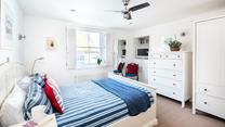 Bedroom 1 features a king size bed with en suite, the perfect place to rest your head after a busy day out.