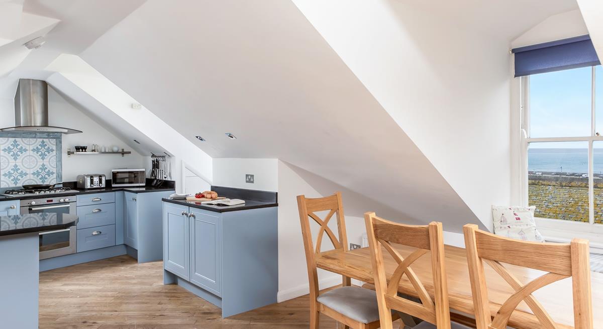 The light and airy open plan living area provides space for all the family.