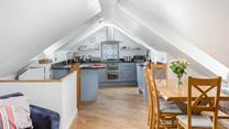 The well-equipped kitchen is perfect for cooking up delicious meals.
