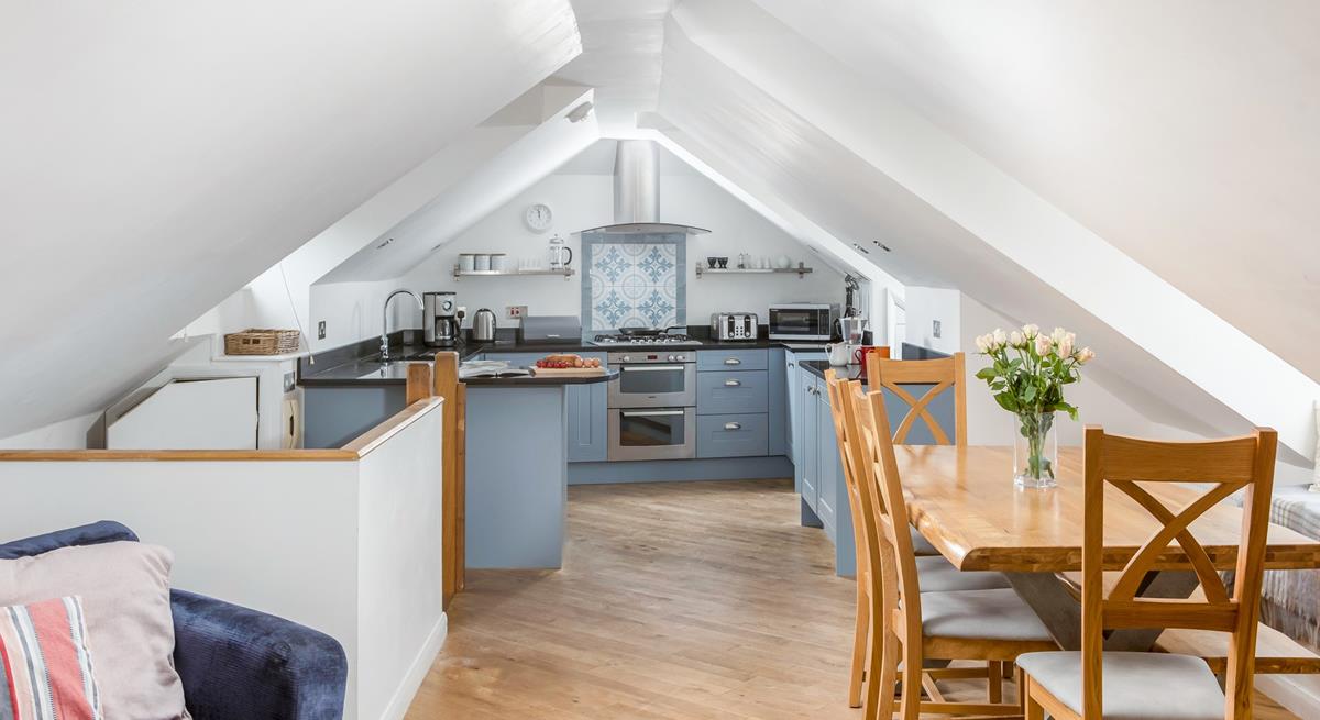 The well-equipped kitchen is perfect for cooking up delicious meals.