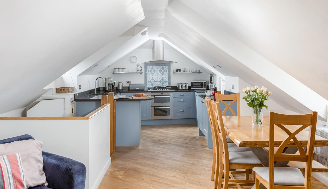 The well-equipped kitchen is perfect for cooking up delicious meals.