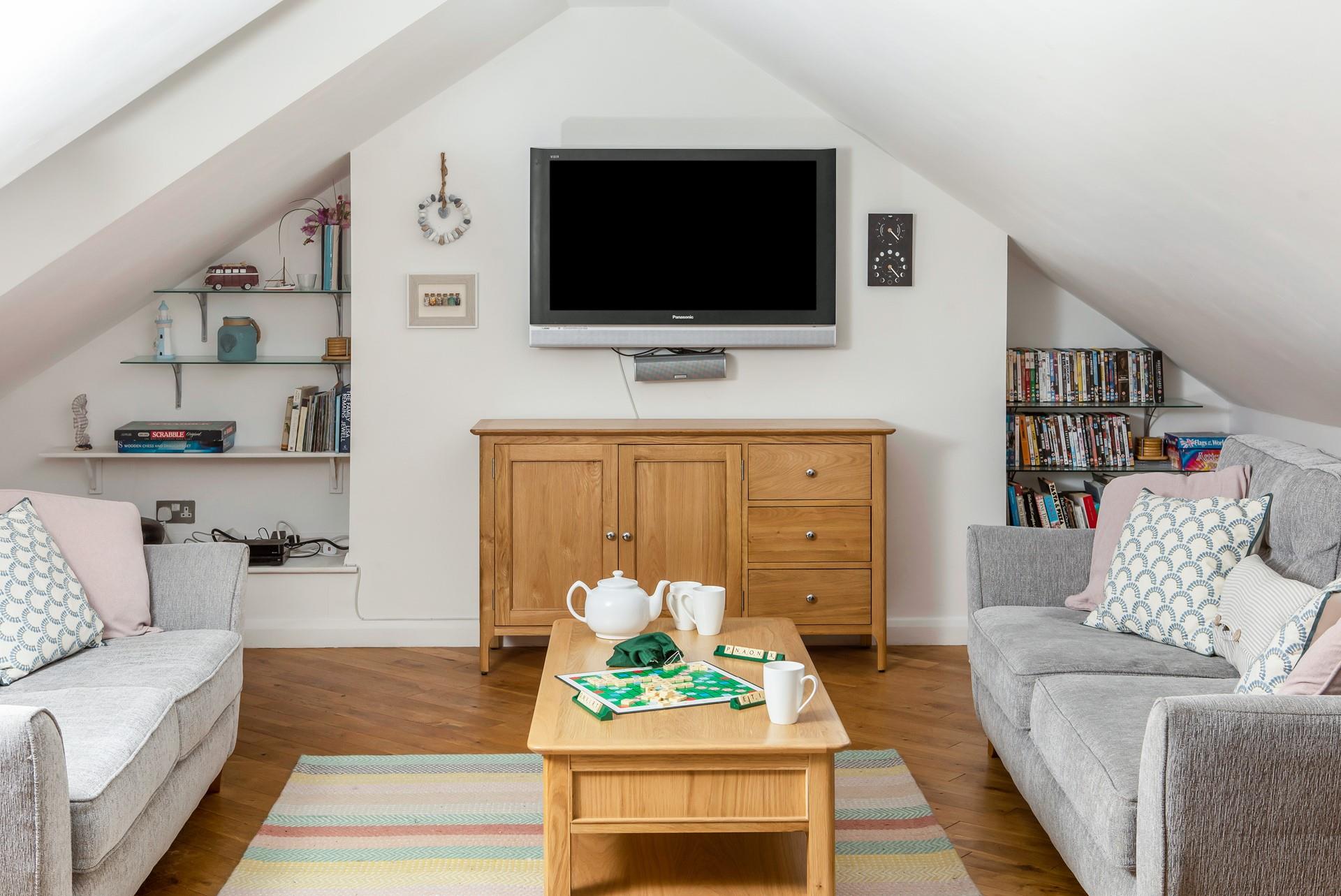 Sofa seating with TV and DVD player for all your entertainment needs.