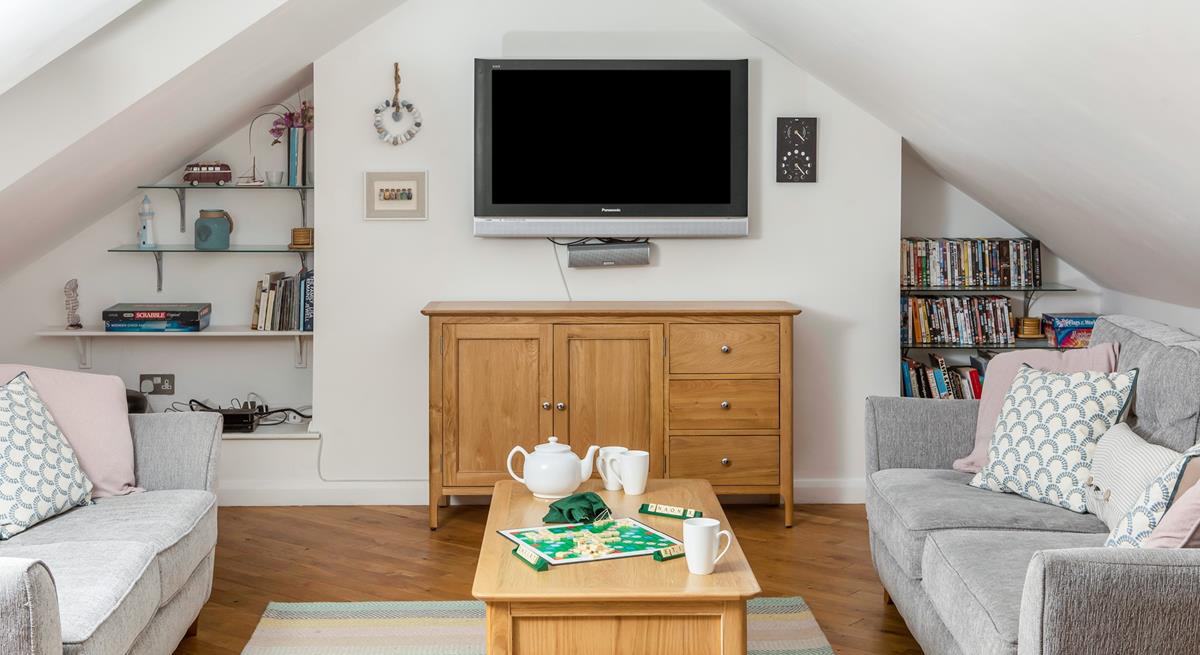 Sofa seating with TV and DVD player for all your entertainment needs.