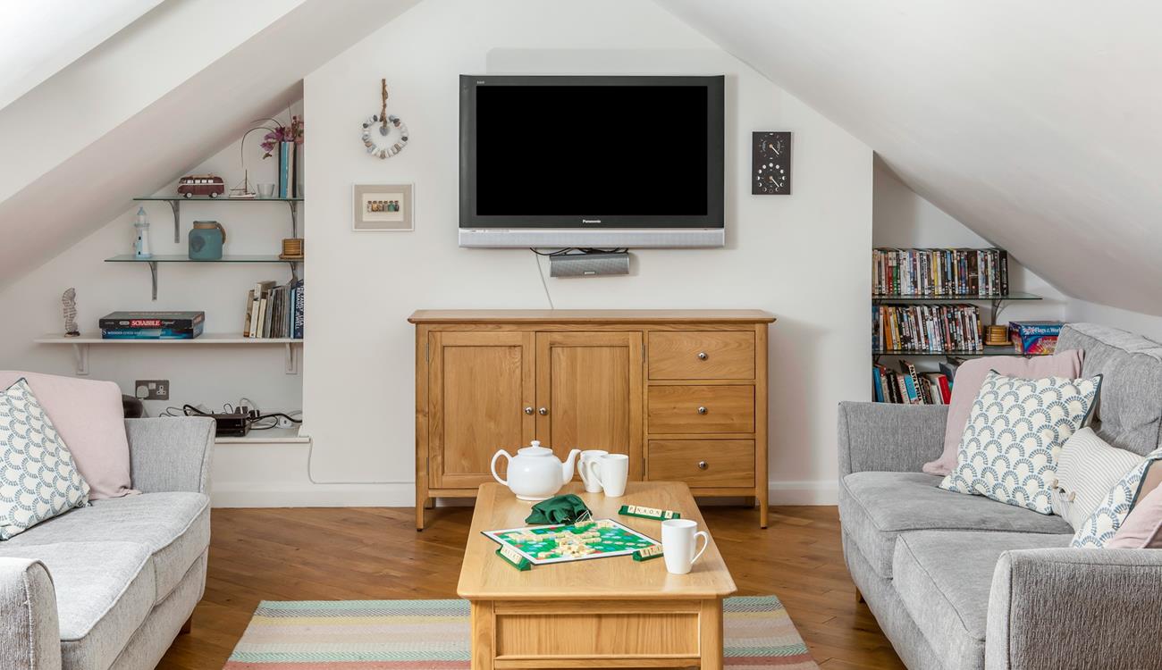 Sofa seating with TV and DVD player for all your entertainment needs.