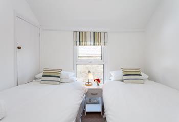 Tuck the kids in for a peaceful night's sleep in this lovely twin room.