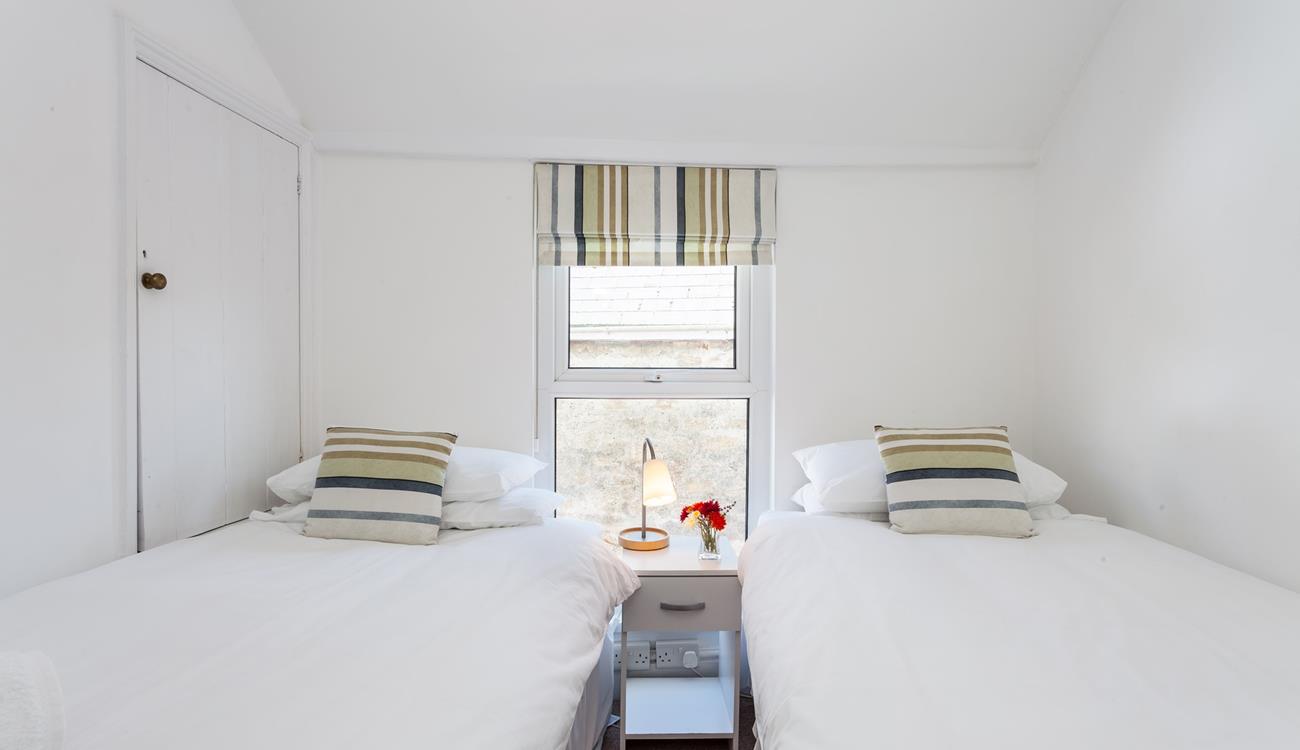 Tuck the kids in for a peaceful night's sleep in this lovely twin room.