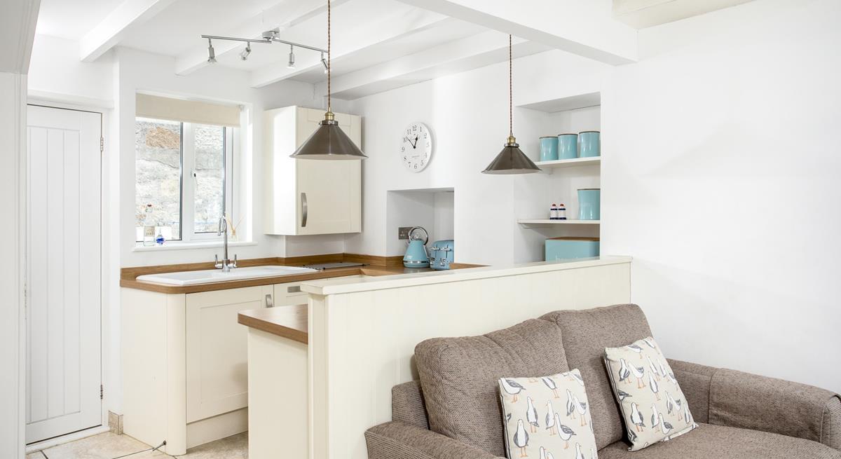 The well-equipped kitchen is perfect for cooking family meals.