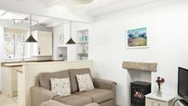 Put your feet up and relax in front of the woodburner effect fire.