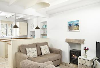 Put your feet up and relax in front of the woodburner effect fire.