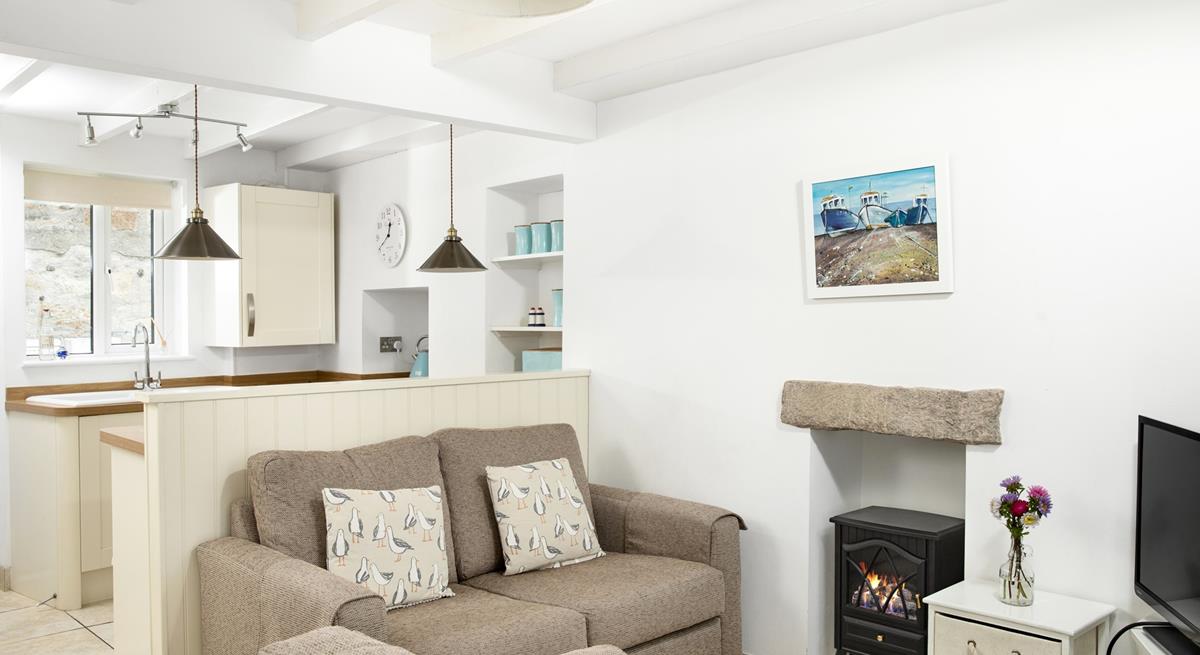 Put your feet up and relax in front of the woodburner effect fire.