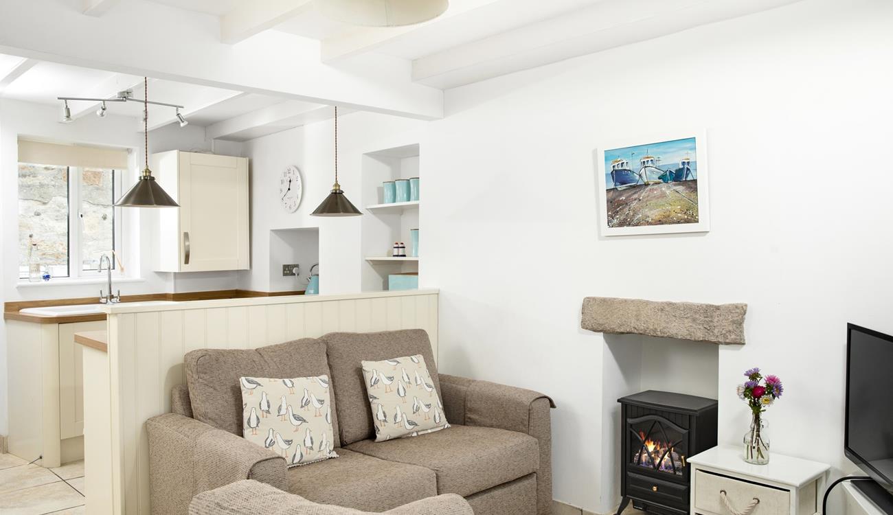 Put your feet up and relax in front of the woodburner effect fire.