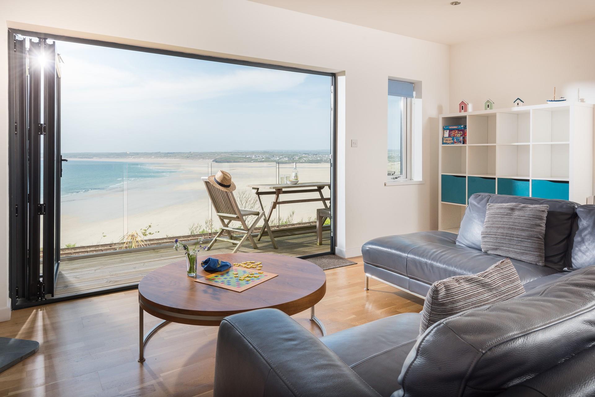 Slide open the bifold doors on a sunny day and let the Cornish air in; relax in the stylish and comfortable open plan living area.