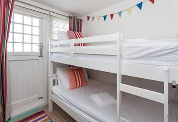 Tuck the kids into the bunk beds after a memorable beach day.