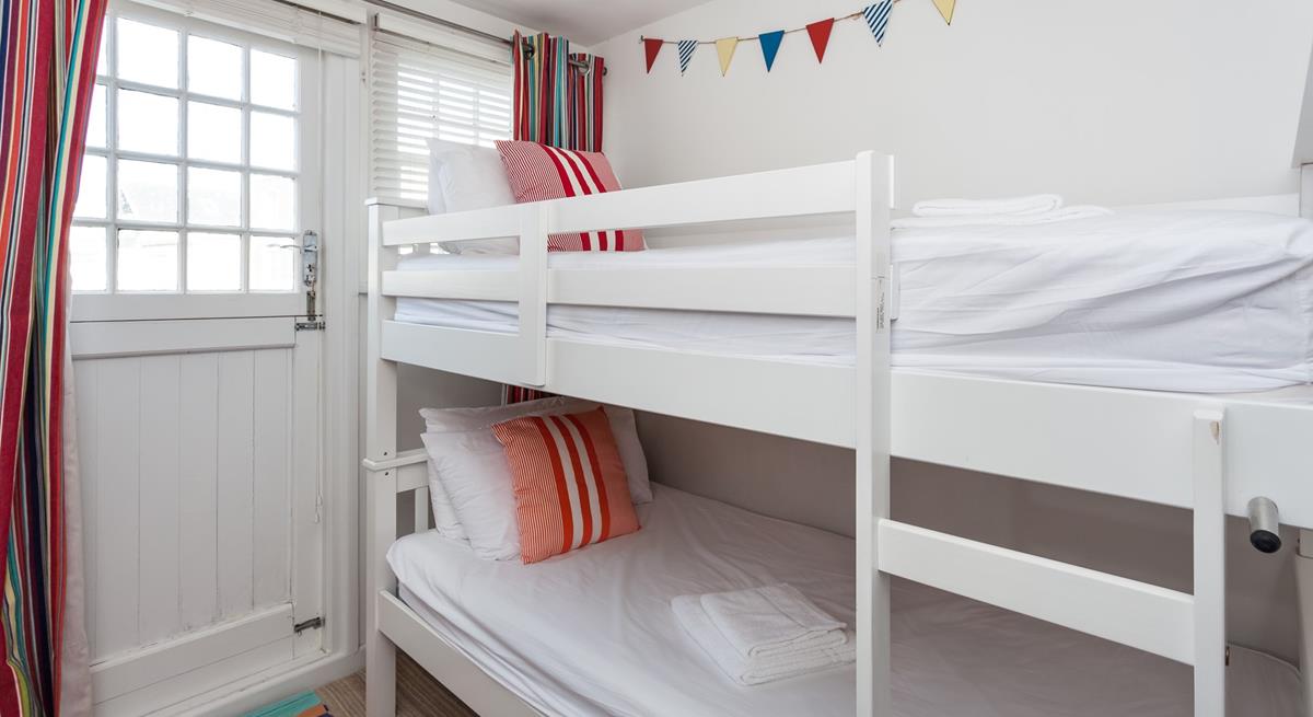 Tuck the kids into the bunk beds after a memorable beach day.