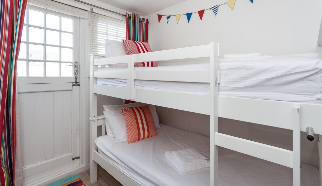 Tuck the kids into the bunk beds after a memorable beach day.