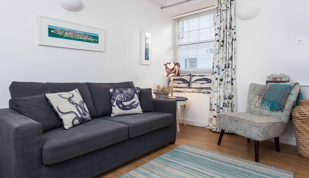 A charming retreat, Bakehouse Cottage seamlessly blends traditional features with modern comfort.