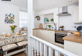 The modern kitchen is well-equipped with modern appliances.