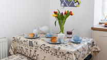 Start the day enjoying buttery pastries around the dining table.